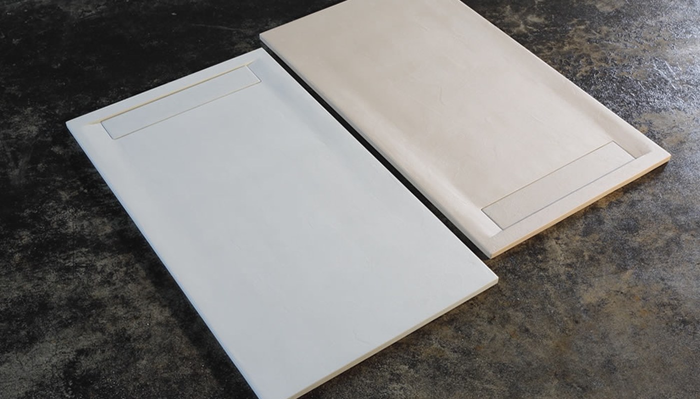 Two MonoTray shower trays finished in two different tones, side by side