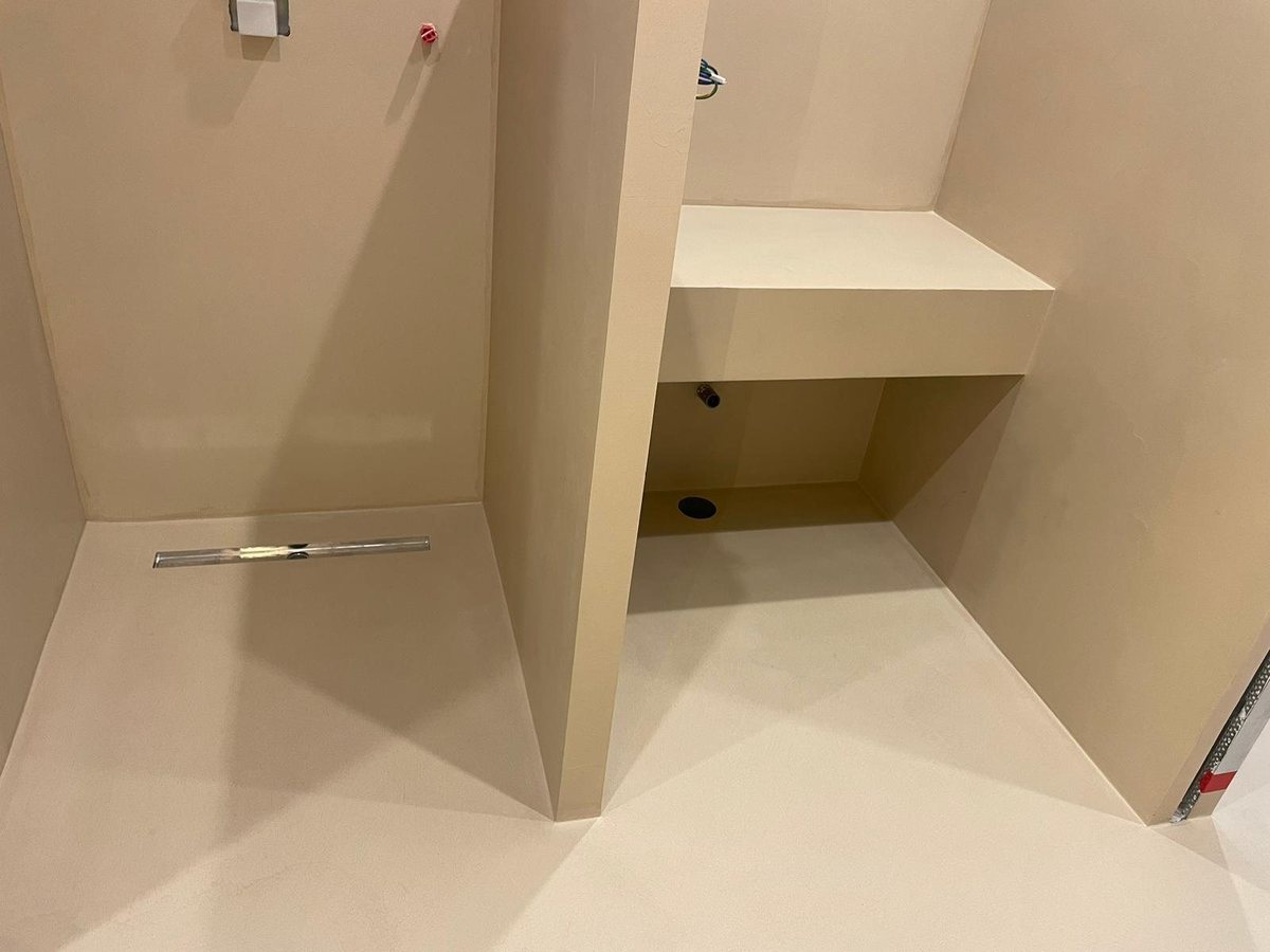 Microcement shower niche in Camel